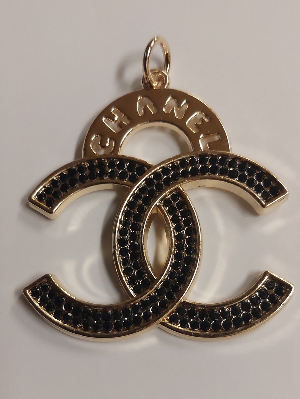 CC Gold-Tone Double CC Charm Pendant with Black Crystals